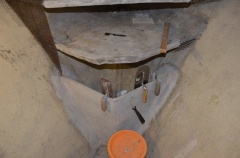 Finished chain locker - in use to hold tools.  This chain locker is being called the Fox Hole, as a joke because of the nautical term 